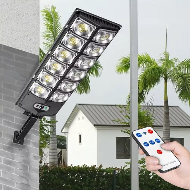 Lampa solara stradala cu panou solar si telecomanda, 100W, suport incorporat, 12 celulele led, rezistent la apa ip66, senzor de miscare si lumina